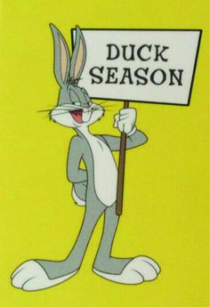 an image of a cartoon character holding a sign that says duck season on the front