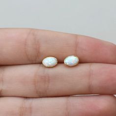 Tiny Gold-plated Round Earrings, Tiny Delicate Gold-plated Earrings, Tiny Delicate Gold Plated Earrings, Dainty Oval Earrings For Everyday, Minimalist 14k Gold Earrings With Gemstone, Elegant Tiny Drop Earrings, Elegant Small Gold Plated Earrings, White Oval Minimalist Earrings, Minimalist White Oval Earrings