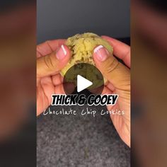 a person holding a cookie in their hand with the words think & gooey chocolate chip cookies