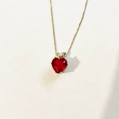 "Ruby Pendant (Lab), Red Heart Pendant (Lab) 8mm, 2 ct. Solid 925 Sterling Silver, 18\" 935 Argentium Anti Tarnish Sterling Chain.  Pendant hand set by me.  Measurements approx.  Stone 2ct., 8mm, 1/4\" wide x 1/4\" long each, Pendant top to bottom approx. 1/2\" long.  It was difficult to show the true color of the Ruby.  To keep item looking like new just wash with liquid soap and water.  Please do not use harsh chemicals or ultrasonic cleaners. Synthetic, cultured or lab-created gemstones are n Classic Red Heart Pendant Jewelry, Red Heart-cut Jewelry For Anniversary, Red Heart Cut Jewelry For Anniversary, Red Heart Cut Necklace For Formal Occasions, Classic Gemstone Necklaces For Valentine's Day, Classic Gemstone Necklace For Valentine's Day, Red Double Heart Necklace For Anniversary, Heart Cut Necklace With Prong Setting For Gift, Classic Red Necklaces For Anniversary