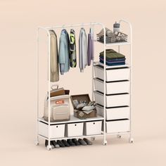 an open closet with clothes, shoes and bags on it's shelves next to a suitcase