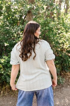 The Melissa Top features a refreshing mint color and a textured design. It has a round neck and ruched sleeves with an elastic band for a comfortable fit. The straight hem adds a touch of elegance to this casual top. Perfect for adding style to any outfit. Model is wearing a large and is 5'5". Plus model is wearing a 1X and is 5'6". Length Bust S 23" 37" M 23.5" 28" L 26" 40" 1x 27" 45" 2x 28" 50" 3x 29" 54" Measurements are approximate and are measured while hanging Fabric and Care 95% Polyeste Casual Green Tops With Gathered Sleeves, Casual Crinkle Texture Tops For Day Out, Spring Sage Tops For Ladies, Casual Textured Knit Top With Puff Sleeves, Casual Textured Knit Puff Sleeve Tops, Textured Knit Tops For Casual Spring Gatherings, Tiered Dresses, Plus Model, Teen Dress