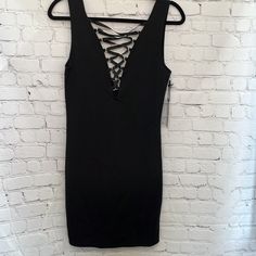 Nwt Forever 21 Black Mini Dress Sleeveless Lace Up Front V Back Front Tie Size: Small Condition: New With Tags Measurements: Pit To Pit: 15 In Length: 33 In Material 76% Polyester 20% Rayon 4% Spandex Sleeveless Night Out Dress With Crisscross Straps, Sleeveless Dresses With Crisscross Straps For Night Out, Spring Sleeveless Bodycon Dress With Crisscross Straps, Sleeveless Mini Dress With Crisscross Straps For Night Out, Black Sleeveless Dresses With Crisscross Straps, Forever 21 Sleeveless Bodycon Mini Dress, Forever 21 Sleeveless Bodycon Dress For Date Night, Forever 21 Sleeveless Mini Dress For Party, Forever 21 Black Sleeveless Mini Dress