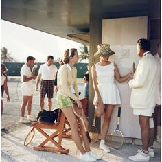 Two women stand talking to a man on the edge of a tennis court in the Bahamas, circa 1957. Behind the main group stand a second group of people talking. (Photo by Slim Aarons/Getty Images) As an authorized Getty Images Gallery Partner, we offer premium quality photographic prints from the Slim Aarons Archive. All photographs are printed and authorized by the Getty Images Gallery, London and are printed from the original negatives and plates on Fujicolor Crystal archival paper. An embossed Getty These Broken Stars, Slim Aaron, Slim Aarons Photography, Slim Aarons Prints, Slim Aarons Poolside, Estilo Gossip Girl, Charo Ruiz, Slim Aarons, Cindy Kimberly