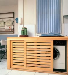 a washer and dryer in a small room