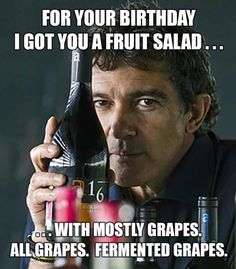 a man holding up a bottle with the caption for your birthday i got you a fruit salad