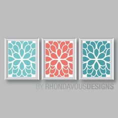 three framed wall art pieces with different colors and designs on the same panel, each featuring an