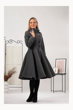 ❥ Enjoy the effortless fit and the feminine sense when wearing our creations! Every piece by NikkaPlace is made with lots of love and attention to detail!  ❥ This coat is lined for extra comfort and warmth. ❥ MATERIALS AND CARE Wool & Polyester Machine Wash (30o) Do not tumble dry or bleach ❥ SIZE Please refer to our size chart (last image in the listing photos). If you're unsure which size to choose please get in touch with us and we can arrange a custom order.  ● The model is 5'5″ (168cm) tall ● The model wears size S  ❥ COLORS Please note that the colors may vary slightly from the picture due to the specifics of your device's screen. ❥ Returns & exchanges Buyers are responsible for return shipping costs. If the item is not returned in its original condition, the buyer is responsible for Skirt Coat, Bridal Accesories, Princess Coat, Gray Winter, Plus Size Outerwear, Winter Coats Jackets, Wool Jacket, Full Skirt, Coat Dress