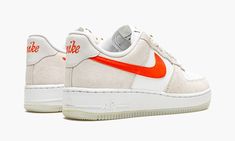 The Women’s Nike Air Force 1 Low SE “First Use” shows respect to the brand’s iconic Swoosh logo with unique, vintage-inspired branding. A June 2021 release by Nike, this women’s edition of the former basketball shoe references the famous Nike logo with special “First Use June 18, 1971” text below a white outline Swoosh on both sides. More “1971” detailing also appears on the insoles and a decidedly retro orange “Nike” logo is embroidered onto the heel. A classic “Nike” insignia with an orange Sw Nike Air Orange, Shoe References, Womens Air Force 1, Custom Sneakers Diy, Hype Shoes, Casual Sneakers Women, Nike Air Force 1 Low, Stadium Goods, Trending Sneakers