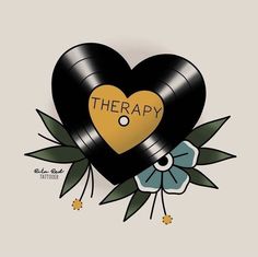 a heart shaped vinyl record with the words therapy on it