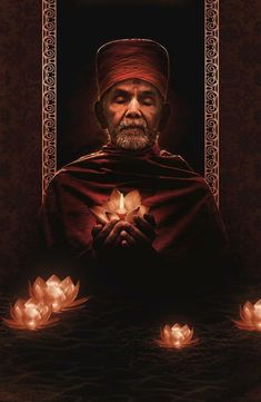 an old man holding a lit candle in front of his face and surrounded by candles