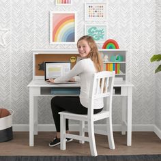 Set the scene for studying with this Kids’ Desk with Hutch and Chair by Delta Children. Clean lines ensure this desk will look great with any decor while the ample storage makes it a versatile piece of furniture for your child’s bedroom. The desk features two built-in cubbies to store pencils, notebooks and more while the hutch features a cork bulletin board to hang important notes or artwork, adjustable cubbies and convenient cutouts to hide wires. The coordinating chair is the ideal size for y Neutral Bedroom Furniture, Built In Cubbies, Workstation Desk, Boys Bedroom Furniture, Nursery Furniture Collections, Girls Bedroom Furniture, Desk With Hutch, Youth Furniture, Adjustable Bed Base