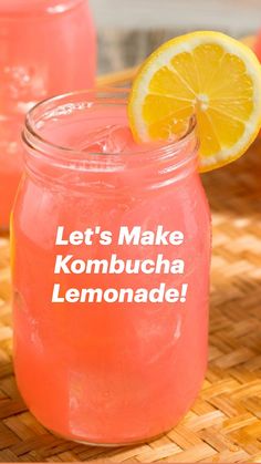 lemonade and water in mason jars on a tray next to some lemons,