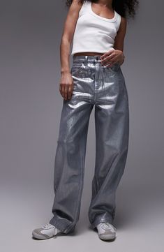 Turn heads in these silver-foil-coated jeans made with nonstretch denim and baggy, full-length legs. 27" inseam; 18" leg opening; 14" front rise; 16 1/2" back rise (size 32) Zip fly with button closure Five-pocket style 100% cotton Machine wash, line dry Made in Turkey Shiny Straight Leg Bottoms For Fall, Fall Shiny Straight Leg Bottoms, Modern Metallic Straight Leg Pants, Metallic Shiny Straight Leg Bottoms, Trendy Metallic Wide Leg Jeans, Trendy Metallic Wide-leg Jeans, Metallic Straight Leg Pants With Five Pockets, Metallic Straight Leg Bottoms For Fall, Fall Metallic Straight Leg Bottoms