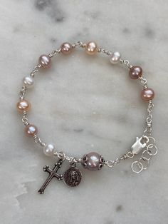 Beautiful handmade 5-7mm freshwater pearls rosary bracelet. All beads are wire-wrapped with Sterling 22 gauge wire and all other metal parts and medals are sterling silver. Rosary Ideas, Pearl Bracelet Silver, Girly Bracelets, Baptism Decorations, Head Board, Pearl Rosary, Rosary Bracelet, Classy Jewelry, Handmade Wire Jewelry