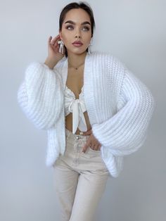 Incredibly beautiful, airy cardigan WITHOUT WOOL! knitted by hand. This cardigan is designed for people with sensitive skin. Incredibly delicate, very soft and skin-friendly cardigan! The yarn in this cardigan is of excellent quality, it does not pill and the cardigan can be washed by hand (do not iron!) This incredible wedding cape can be used as a wedding ballerina or jacket for women. It is not hot in it and will gently warm your shoulders. In any color palette, such a cardigan will look lush Wedding Ballerina, Coat Jacket Women, Wedding Cardigan, Bridal Shrug, Wedding Cape, Mohair Cardigan, Short Cardigan, Cardigan Women, Sweater White