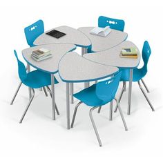 a group of blue chairs around a table with a book on it's top