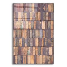 a wooden wall with many different colors and patterns on it's sides, including wood planks