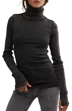 A scrunched turtleneck and soft ribbing adds to the cozy vibes of this long-sleeve top finished with thumbhole cuffs for added warmth. Turtleneck Long sleeves with thumbhole cuffs 96% cotton, 4% elastane Machine wash, dry flat Imported Rib Top, Seamless Top, Cat Top, Ribbed Crop Top, Free People Sweater, Nordstrom Store, Signature Design, Black Fits, Free People