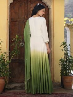 This is a beautiful 2-piece set. The set comes with hand embroidery anarkali kurta has round neck, 3/4th sleeves, ankle length & teamed organza dupatta. Total No of Set-2 Kurta Fabric: Viscose Muslin Dupatta Fabric-Organza Work Done on Kurta- Hand embroidery detailing. Kurta Length-Ankle Length Sleeve Length: 3/4th Sleeves Neck: Round Neck Style: Anarkali Color: Green, White & Ombre Occasion: Party Wear Washing Instructions: Hand Wash or Dry Clean