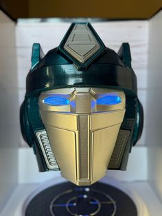 a close up of a robot mask on display