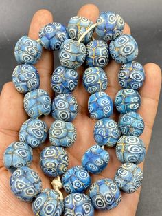 beautiful authentic unique piece Gabri  with beautiful colors old ancient afghani Gabri beads Bohemian Round Beads For Festivals, Natural Stone Round Beads For Festivals, Unique Natural Stone Beads For Festival, Unique Natural Stone Beads For Festivals, Unique Natural Stones Beads For Festivals, Artisan Beads For Jewelry Making, Traditional Handmade Turquoise Beads, Traditional Large Blue Beads, Traditional Handmade Oval Beads