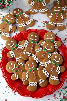 a red plate topped with lots of ginger cookies