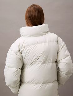 A protective essential against cold temperatures, this puffer coat has a down fill for extra warm layering. Made with a mock neck with an interior knit bomber collar. Designed with a front zip closure and slip pockets at the sides. Down Puffer Jacket, Cold Temperature, Puffer Coat, Outerwear Women, Puffer Jacket, Mock Neck, Layering, Puffer, Collar