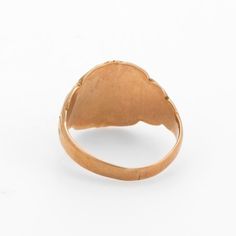 This is part of Chairish’s Fine Jewelry assortment.  Lovely antique Victorian signet ring (circa 1880s to 1900s), crafted in 10 karat rose gold.   The centre oval is inscribed yet due to wear we are unable to decipher the letters.   The side shoulders feature a pretty swirling design that terminates to the oval mount. The saddle of the ring is low and allows the ring to sit flat on the finger.     The ring is in good condition with patina and wear evident. We tend not to clean our antique pieces Victorian Gold Domed Rings, Victorian Domed Gold Rings, Antique 14k Gold Signet Ring With Rose Cut Diamonds, Victorian Engraved Ring With Rose Cut Diamonds, Antique Oval Engraved Ring With Rose Cut Diamonds, Victorian Oval Engraved Ring With Rose Cut Diamonds, Heirloom Oval Jewelry With Screw Back, Antique 14k Gold Signet Ring With Oval Cabochon, Victorian Oval Yellow Gold Signet Ring