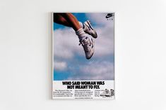 a magazine with an advertisement for nike on the front and back cover that reads, who said woman was not meant to fly?