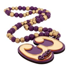 a purple and gold beaded necklace with the number 35 on it's side