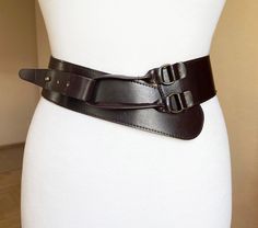 Belt length (when it is fastened) at longest position : 97 cm/ 38" Length at shortest position: 93 cm / 36" Width: 5.8 cm/ 2.3" Very good condition   See photos for best details You can see various belts in our shop: https://www.etsy.com/shop/AntiqueArchives?ref=seller-platform-mcnav§ion_id=27028379 I ship internationally registered airmail with tracking number from Lithuania Please, feel free to contact us if you have any questions!      5564 Adjustable Vintage Corset Belt With Removable Feature, Adjustable Vintage Corset Belt, Vintage Brown Belt, Vintage Brown Belt With Leather Strap, Vintage Brown Leather Belt, Vintage Handmade Brown Belt, Vintage Brown Belt With Rivets, Lithuania, Suspender Belt