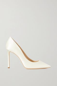 You won't regret choosing pumps as classic as Jimmy Choo's 'Romy' pair for your special day. Crafted in Italy from ivory satin, they have a leg-lengthening pointed toe and 100mm stiletto heel that'll balance long hemlines. Jimmy Choo Romy 100, White Stiletto Heels, Jimmy Choo Wedding Shoes, Ivory Heels, Jimmy Choo Bridal, Bridal Pumps, Jimmy Choo Romy, Wedding Pumps, Jimmy Choo Heels