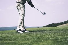 a man hitting a golf ball on top of a lush green field with the words nysbc's 3rd annual golf outing salem golf club