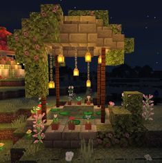 an image of a garden at night with lanterns on the gazebo and flowers in the foreground