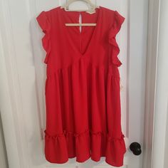 Altar'd State Mini Dress Size Large Nwt (Msrp $69.95) Short Sleeve Ruffles V-Neck Lined Red Shoulder To Hem 33" Pit To Pit 20.5" Measurements Are Approximate Red V-neck Dress For Spring Vacation, Red A-line V-neck Dress For Spring, Casual V-neck Holiday Dress, Red V-neck Dress For Spring Date Night, Red V-neck Mini Dress For Brunch, Red Flowy V-neck Dress, Casual Red V-neck Dress For Spring, Red V-neck Mini Dress With Ruffle Hem, Red Short Sleeve V-neck Dress For Spring