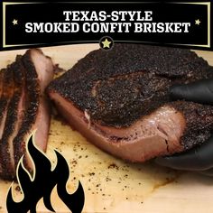 a close up of a person cutting meat on a cutting board with the words texas style smoked confit brisket