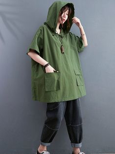 Discover ultimate comfort and style with our Women's Loose Tops. Made from high-quality cotton. these tops offer a soft and breathable feel. Available in versatile black and refreshing green. they are perfect for any casual occasion. The short sleeves and hooded collar add a contemporary touch to your look. while the solid color pattern ensures easy pairing with any outfit. Designed in one size to fit all. the measurements include a length of 73cm. bust of 146cm. shoulder width of 51cm. and slee Plain Green Top For Summer, Black Solid Color Cotton Top, Green Plain Tops For Spring, Black Baggy Tops For Spring, Cotton Blouse With Relaxed Fit In Solid Color, Black Cotton Tops, Green Tops With Pockets, Baggy Black Casual Tops, Black Casual Baggy Tops