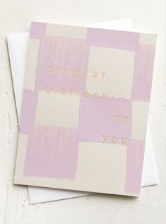 a card with the words congratulations to you on it