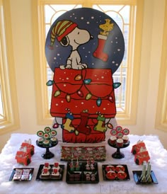 a charlie brown christmas party with decorations and treats