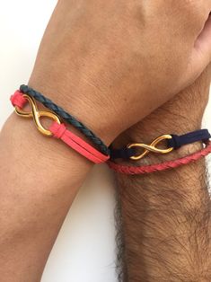 "This is a two bracelets pack, for lovers each one with a provocative braid, a faux suede strip and a cute infinity charm.   The woman bracelet fits 15 cm ( 6\")wrists and the man 20 cm (8\").   This exotic mix makes a unique and fun bracelet, add it to any outfit for the perfect touch of urban chic.  Modern urban feel in beautiful natural colors.  This bracelet is an ideal treat for youself or perfect as a GIFT for anyone you love.  We strive for 100% customer satisfaction. If any problems are encountered upon receipt, please notify me for a quick and friendly resolution.  *Avoid getting the bracelet wet to lengthen the life of your bracelet*  Don't forget to make sure your Etsy address is correct as that is where I will ship it to.   Check out the main shop page to browse our full line: Boho Chic Accessories, Relationship Bracelets, Matching Couple Bracelets, Couples Bracelets, Leather Anniversary Gift, Bracelet Pack, Leather Anniversary, Bracelet Couple, Infinity Charm