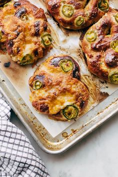 several baked food items on a baking sheet