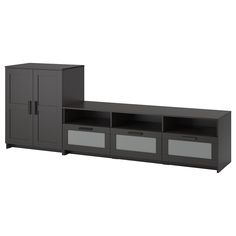 an entertainment center with two doors and three drawers on each side, in black and white