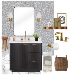 a bathroom with blue and white wallpaper, gold accents and wooden vanity sink area