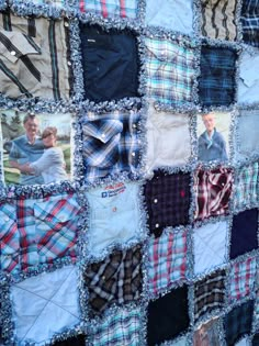 a quilt made out of many different types of shirts