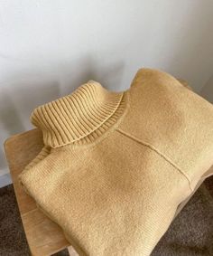 Shown is one of our sweaters in yellow folded nicely and sitting on a chair. This style is available for preorder on our website and is fully available on 8/25. Outfit Inspo Fall, A Chair, Fall Outfits