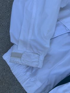 "Make this jacket your go-to winter puffer. Estimate Size: XL Brand: Towne by London Fog Has a few barely visible stains as shown in images Length: 25\" Bust: 50\" Waist: 48\"" White Weatherproof Long Sleeve Outerwear, Casual White Outerwear With Elastic Cuffs, White Windbreaker With Pockets For Cold Weather, Vintage Puffer Jacket, Nautical Vintage, Rose Cocktail, Handmade Backpacks, Winter Puffer, London Fog