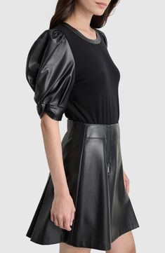 A ribbed-to-fit bodice pairs with puffed faux-leather sleeves in a high-style top that's all in for nights out. Crewneck Elbow-length sleeves 70% viscose, 23% nylon, 7% elastane with 100% polyurethane contrast Machine wash, dry flat Imported Fall Party Top With Structured Shoulders, Fall Party Tops With Structured Shoulders, Fitted Tops With Padded Shoulders For Fall, Fitted Puff Sleeve Top With Gathered Sleeves For Fall, Fall Fitted Puff Sleeve Top With Gathered Sleeves, Chic Fitted Puff Sleeve Top With Pleated Sleeves, Chic Tops With Padded Shoulders For Fall, Black Fitted Puff Sleeve Top For Evening, Trendy Fitted Puff Sleeve Top For Workwear