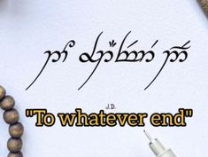 the words to whatever end are written on a piece of paper next to a pen