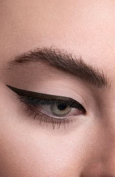 What it is: A thin, soft, waterproof gel eyeliner that offers precision accuracy and ease of application. What it does: No pot, no brush, no cleanup required. Its unique formula is poured into a slim mechanical component and has the malleability, intensity and staying power of a traditional eyeliner. The transfer-proof, long-lasting formula delivers extended wear.How to use: Two clicks is all you need to line the eye. Each advanced mechanical pencil lasts for approximately 17–20 uses. Style Name Elongated Eyeliner, Monolids Makeup, Cat Eye Eyeliner Tutorial, Bad Eyeliner, Traditional Eyeliner, Creative Eyeliner, Eyeliner Guide, Tattoos For Women Meaningful, Cat Eye Eyeliner